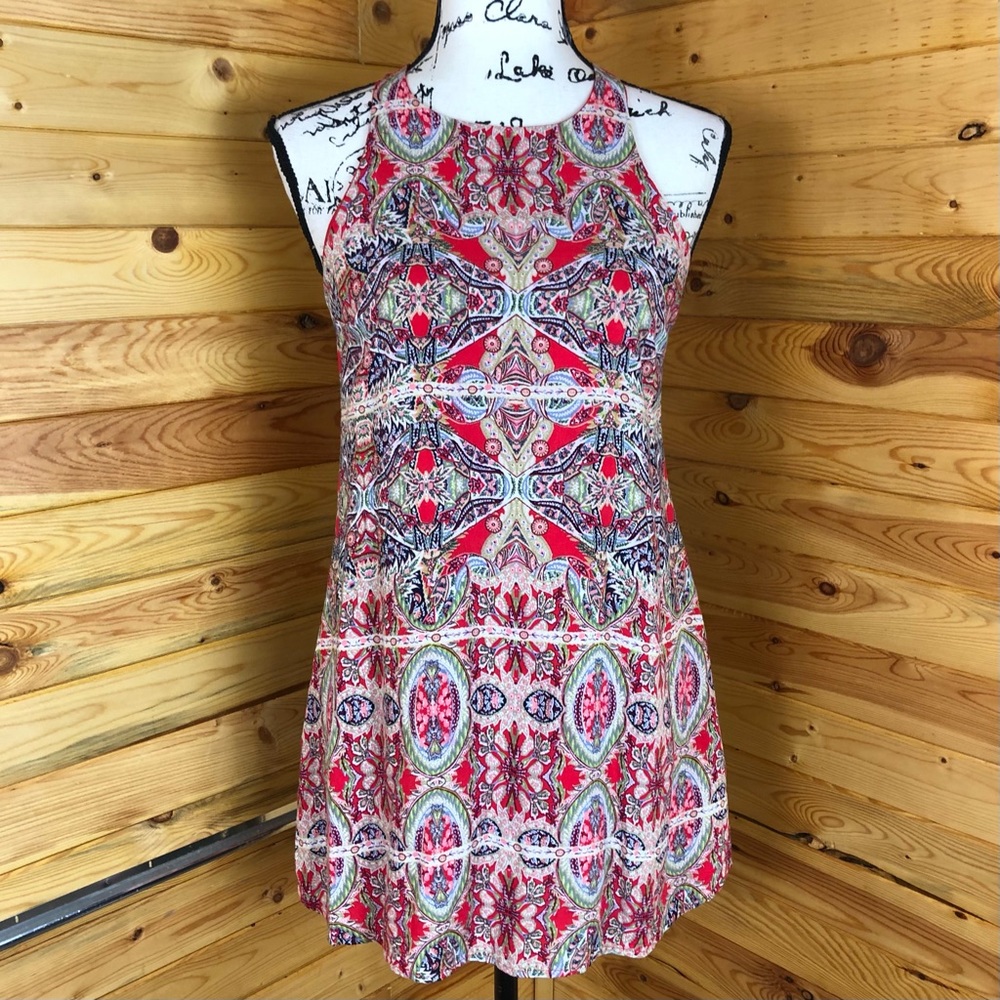 LULU’s adorable print mini dress with button back